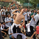 Bangladeshi students shout slogans and block a road during a protest in Dhaka, Bangladesh, Aug. 04.